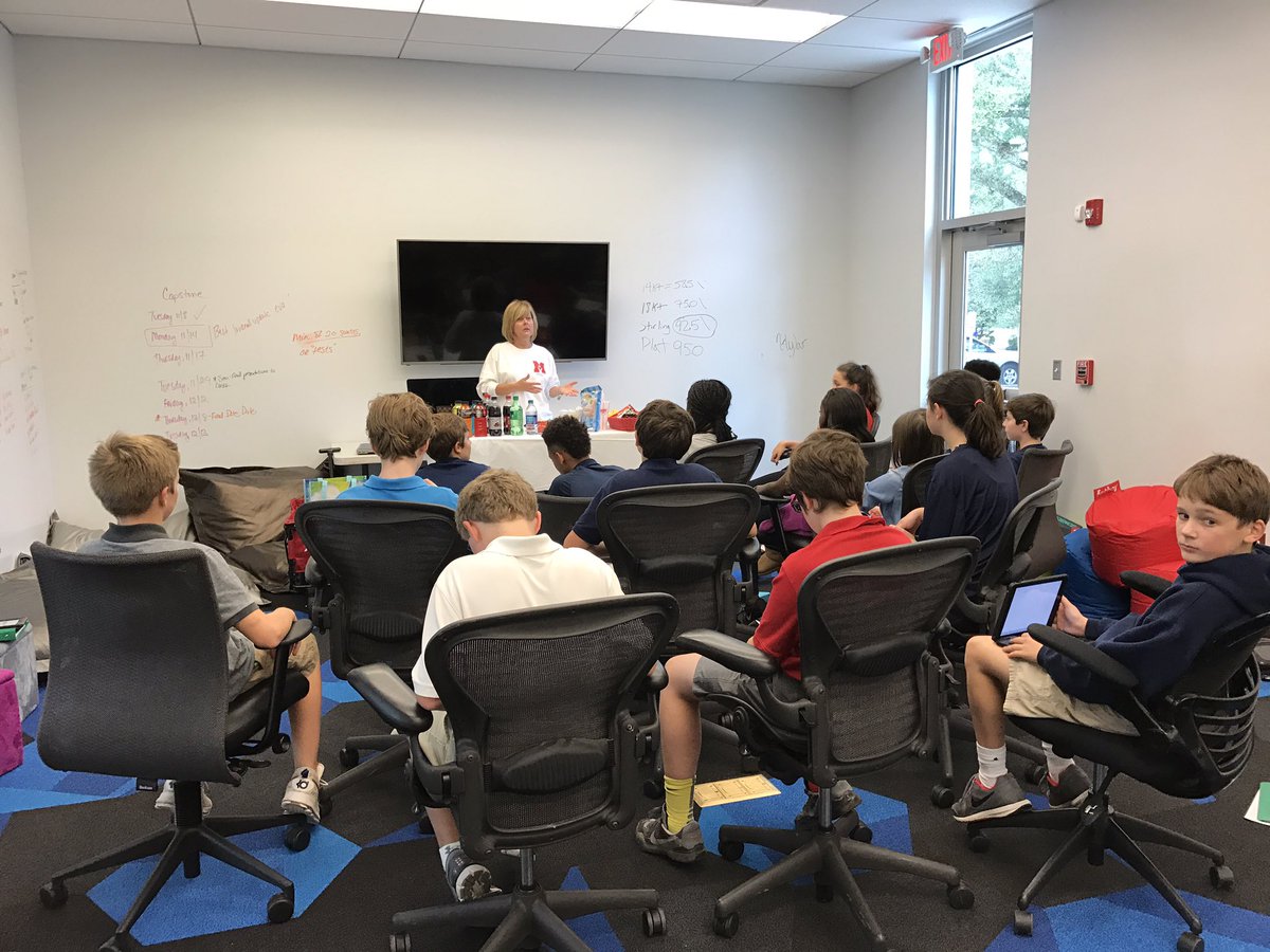 mrsrlovisa's tweet image. Melanie Manzella talking to @STM_Math7 about the math involved in running the concession stands @stmsaints