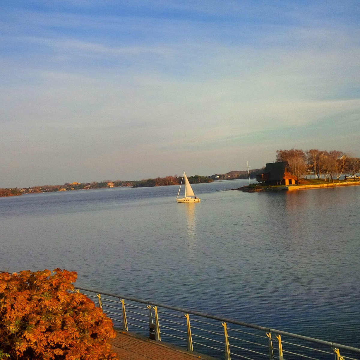 November 18th. There's a sailboat on the lake. #paradoxical #autumn #warmtemperatures #sunny #ramseylake #cardio #boardwalk #fitness ⛵️️🍁🍂