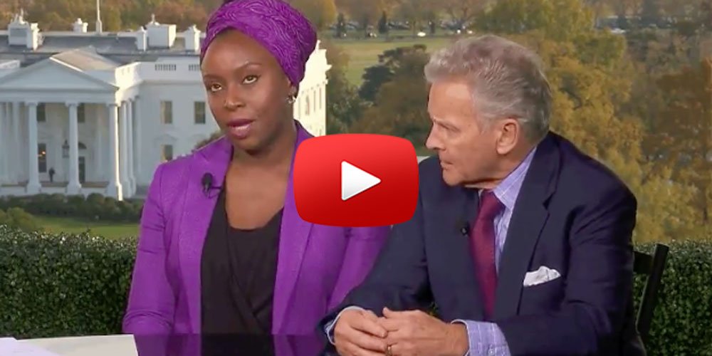 ELLEmagazine's tweet photo. This man said Trump wasn't racist, Chimamanda Ngozi Adichie's response shut him right up: https://t.co/Q26aowq1c9 https://t.co/1xpdy8pGcq