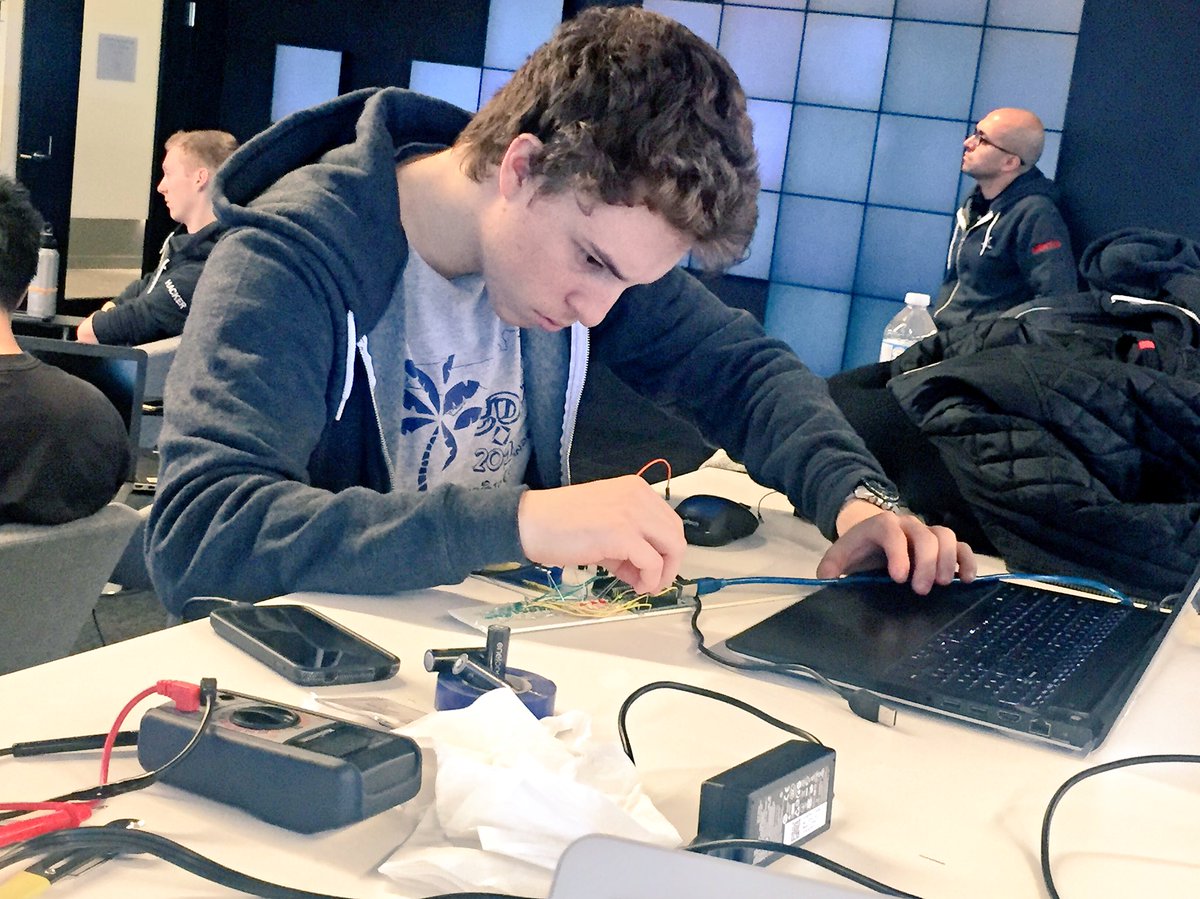 finhacks's tweet photo. Cables, boards, concentrated faces. All here at @CiscoCanada's and @TD_Canada's #IoT meets #FinTech #hardwarehackathon https://t.co/JaIPBjJpAt