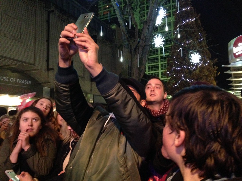 TanyaYilmaz's tweet photo. Fans swarm to take selfies with Ryan Thomas #swindonlightswitchon https://t.co/e0Xj6uqSsU