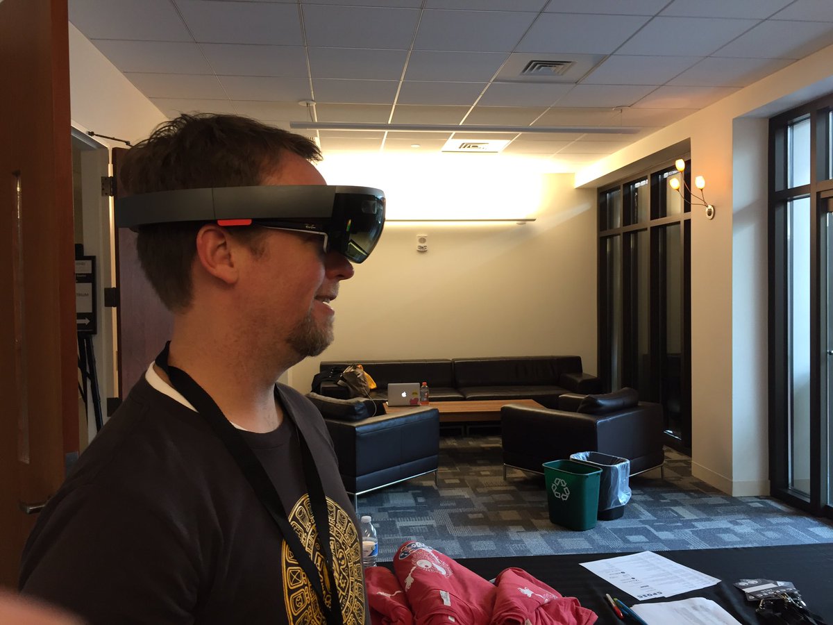 mcbeniwal's tweet photo. @tramel_james playing with @HoloLens at #CPOSC2016 https://t.co/OqeFFgB6fl