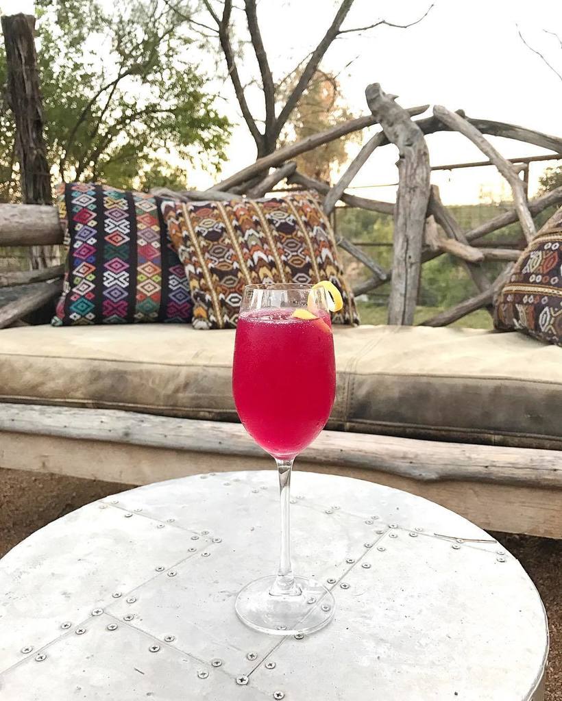 What a *gorgeous* day in Austin! All I want to do is drink this Beet-lejuice cocktail at @jacobysatx, made with gin…