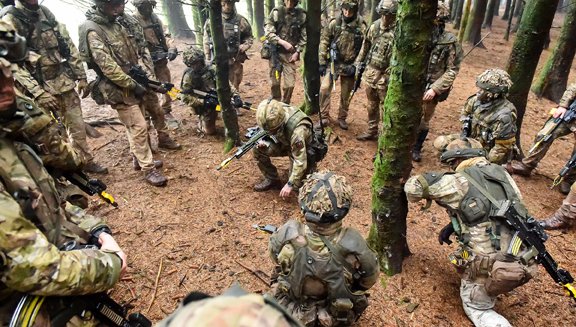 Troops from multiple regiments take part in the Section Commanders Battle Course at the Infantry Battle School in Breacon, Wales, this week