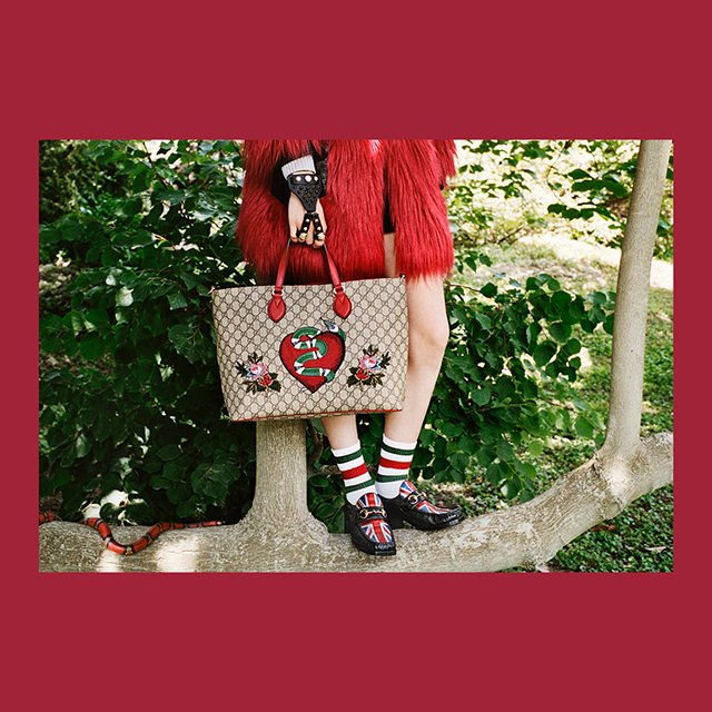 gucci's tweet photo. High up in the #GucciGarden with a limited edition GG motif embroidered tote. #GucciGift https://t.co/iecDmlAx5g