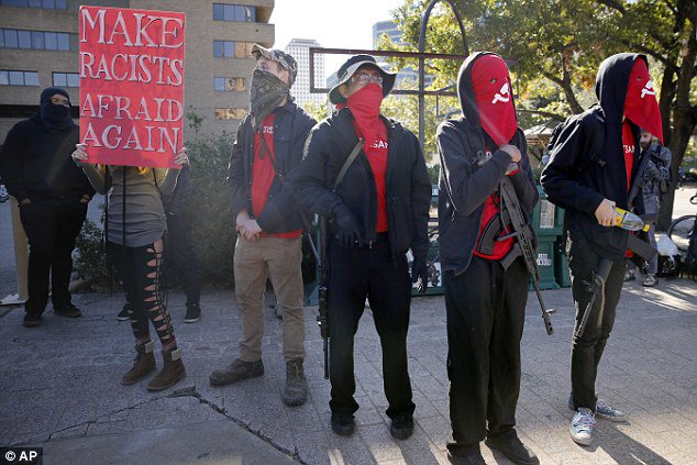 RadicalAssembly's tweet photo. Anti-fascists getting serious in Austin, Texas, watching over nearby 'White Lives Matter' rally #antifa @AntiFascistNetw https://t.co/08o94kVTIa