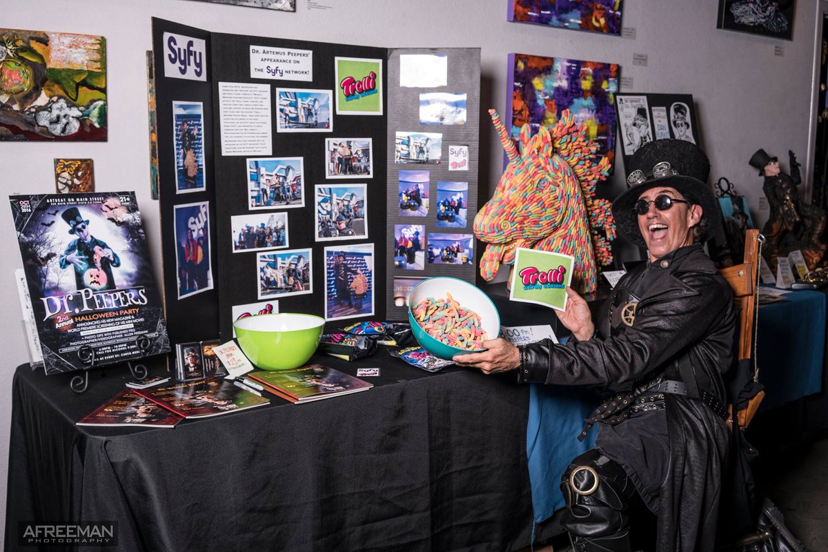 DeanLeCrone's tweet photo. With @Syfy display, @Trolli_USA gummy unicorn trophy &amp; fan art during my 2nd Annual Dr.Peepers Halloween Party! @drpeepers82 #trolli #SyFy https://t.co/x4mve5iCbG