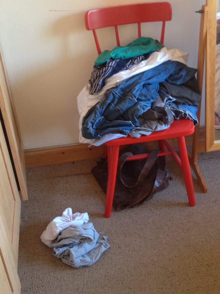 Clothes that are too dirty for the closet but too clean for the laundry