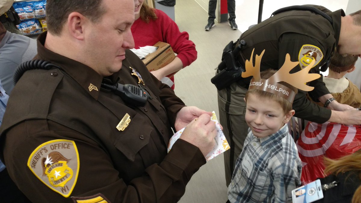 EauClairePD's tweet photo. #KidsNcops round 1of 3 is over. Shopping. Santa. Signatures. https://t.co/J0MqvZxgeE
