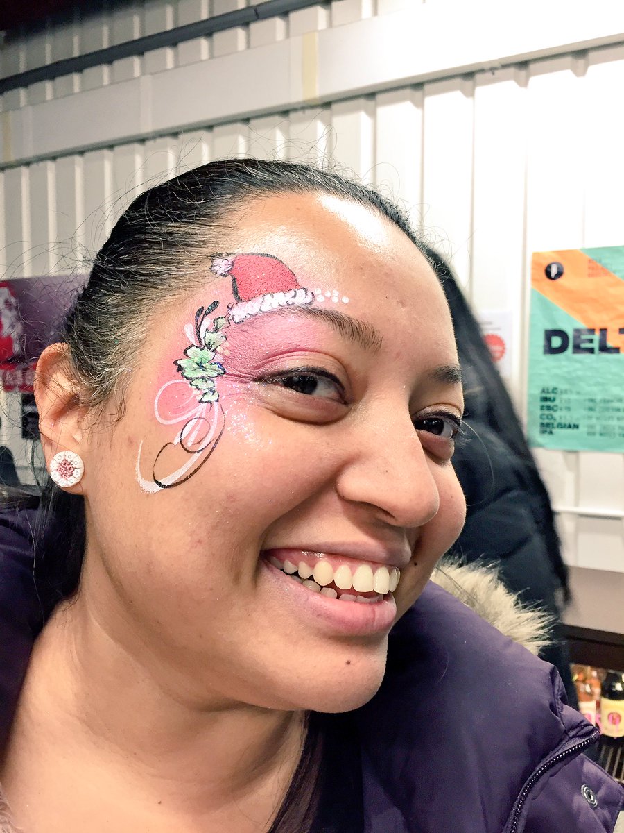 Check out the adorable festive face paints from <a href="/MimisMunchkins/">Mimi's Munchkins</a> at our final Yelp event! Awwww. 🎅🏼