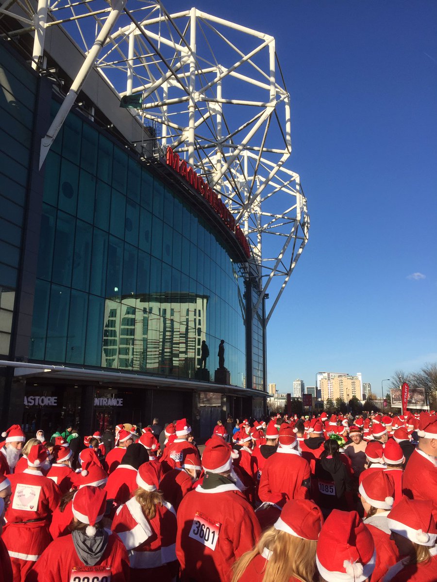 JasonHall's tweet photo. Santa run at Old Trafford. Staff from pharmacy at Manchester University ran for Pharmacy Support https://t.co/qDyTkm5UtI