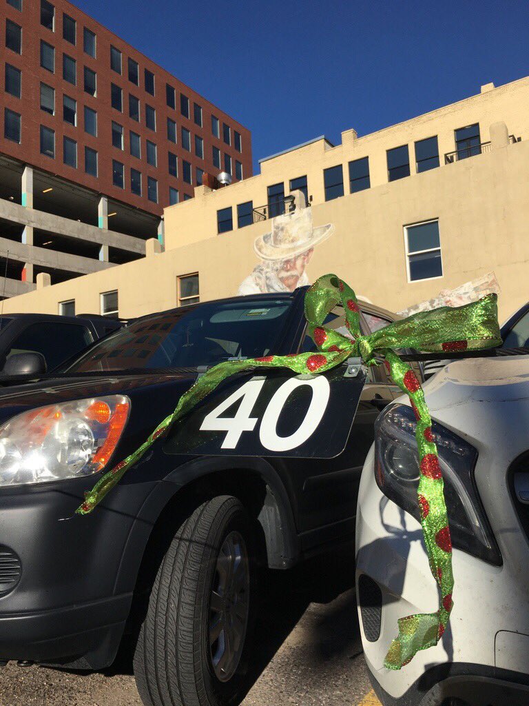 parkifi's tweet photo. On the 4th day of parking, ParkiFi gave to me four hugs from Santa and free parking in the city. #12DaysOfParking Did you find us?? https://t.co/UoZLxYjTpE