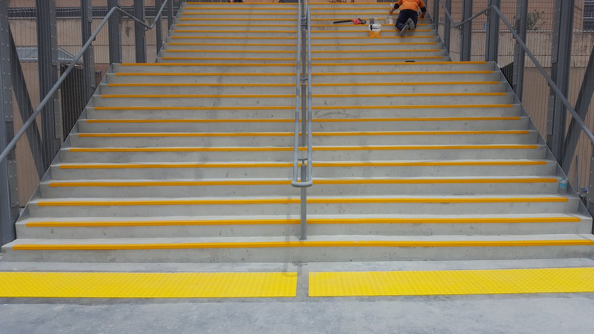 StepsolveAus's tweet photo. Finished. Adelaide Festival Centre steps. Safety yellow SN4 grit range, peel &amp; stick tactile pads. #adelaide #safety #nosing #tactile #tgsi https://t.co/0mchXOjiUK