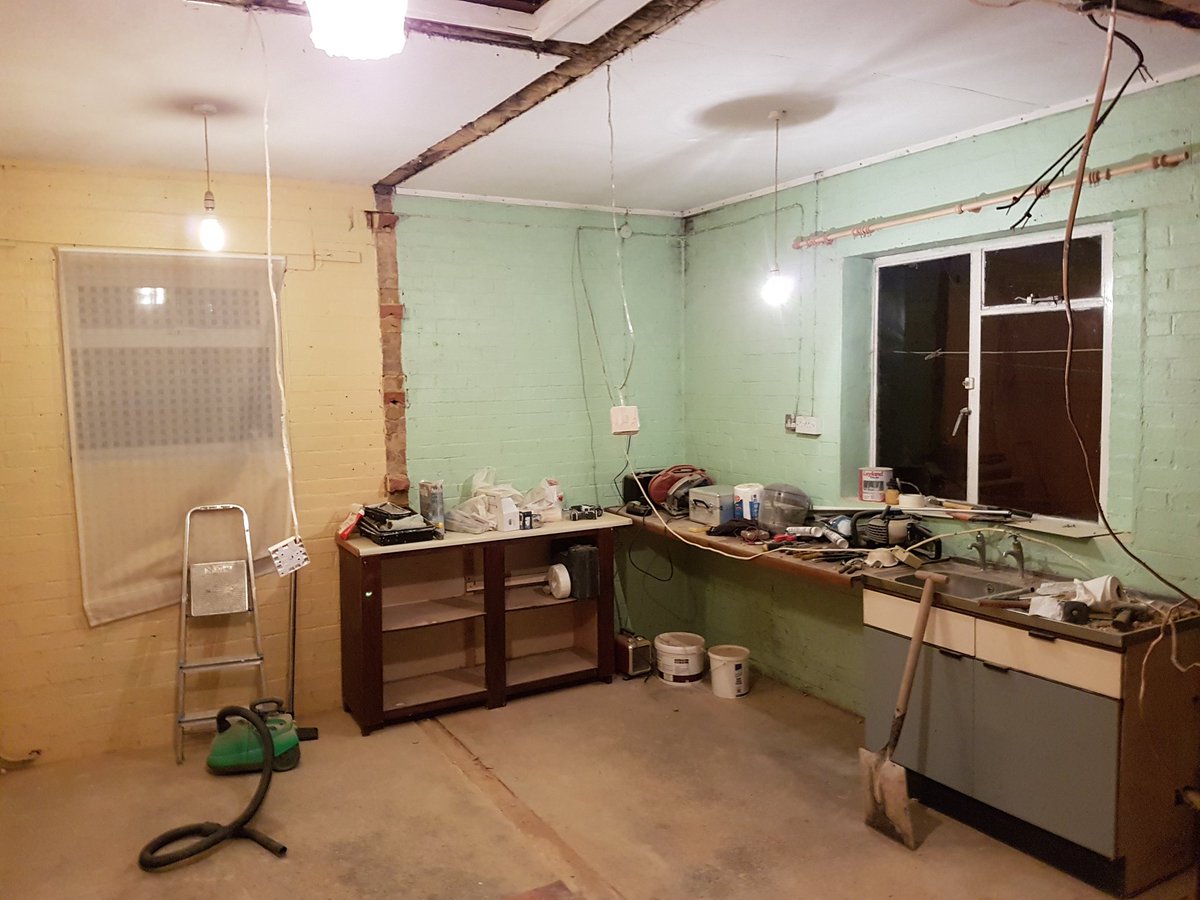 Weekend 2, 5 walls down, cleared, stud wall up, bedrooms stripped, bathroom painted and one massive fire = progress