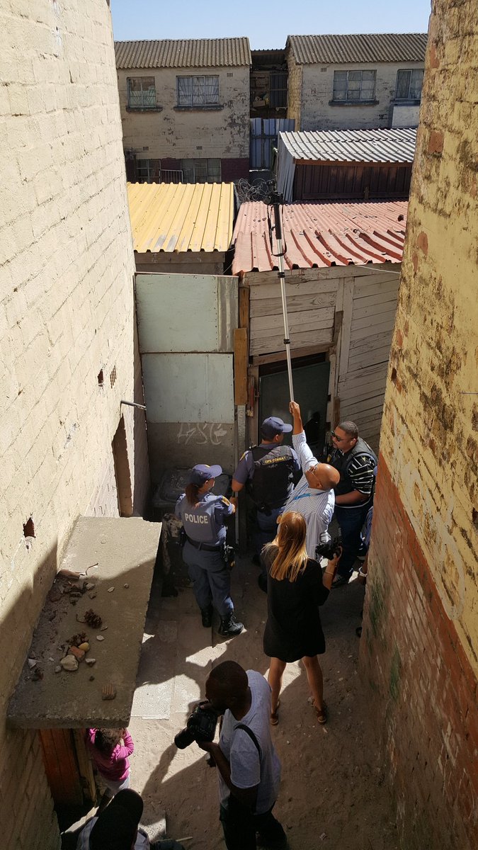 tanyajourno's tweet photo. Police in Manenberg searching for drugs as part of their festive season lock down @WeekendArgus #festivelockdown https://t.co/oVs7r9RBvE