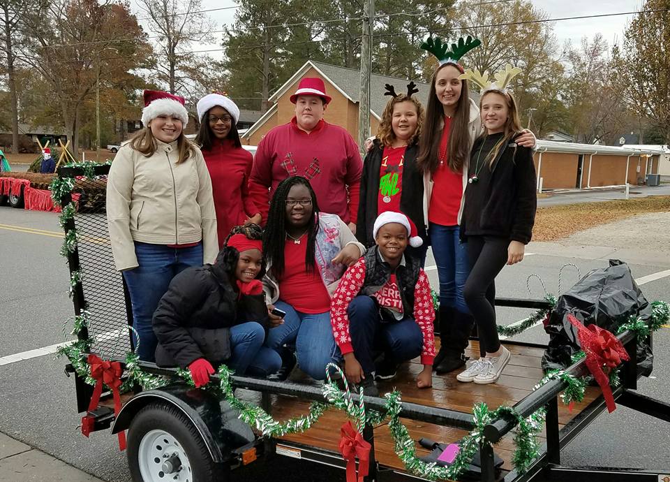 ColumbusCharter's tweet photo. Beta Club marched in the #Whiteville Christmas Parade to promote OPEN ENROLLMENT Jan. 1-31! We are tuition-free, K-8- join us! #ColCo https://t.co/ZsmJD8riTN