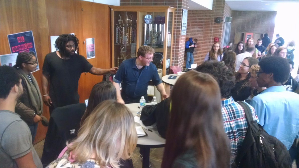 LibrarianMorath's tweet photo. Assembly ends and the mob begins! Students can't get enough of @KielyBrendan @JasonReynolds83 Setting the bar for authors #StateHighReads https://t.co/HtSqtR0hwC