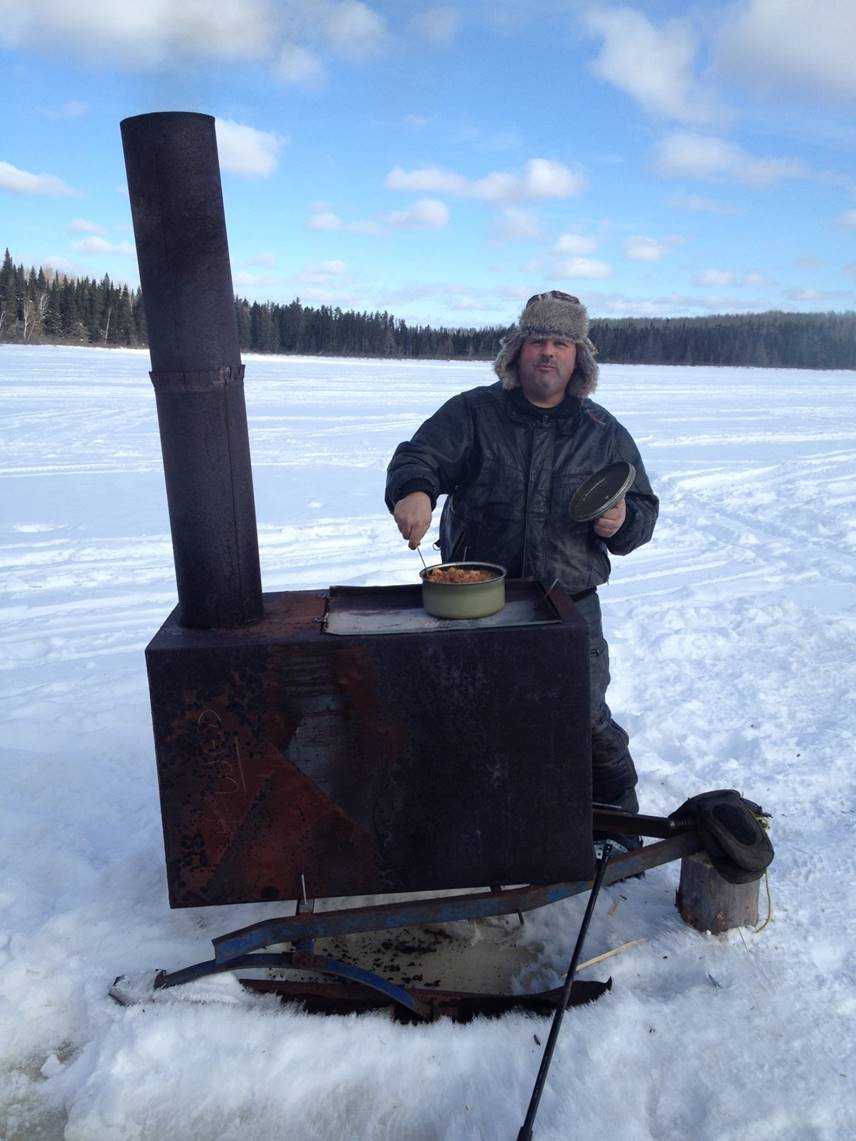 VisitChapleau's tweet photo. Don't let winter stop you from cooking outdoors! #ExploreChapleau #IceFishing https://t.co/vEQQ0afcGZ