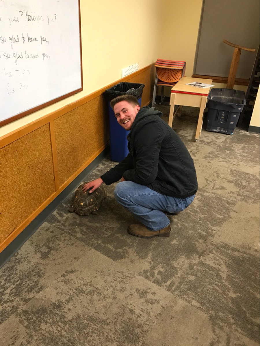 ESG_UC's tweet image. Here's our Vice President, @_MGetz petting Roberta the tortoise!