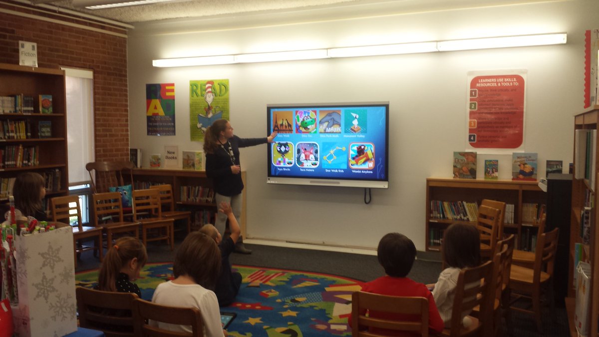aconlin58's tweet photo. @ConlinPrincipal. Mrs. O'Neill working with the apps with the new addition to the library - a Smart TV. Great picture- lots of fun ahead https://t.co/DMyFHcEXtL