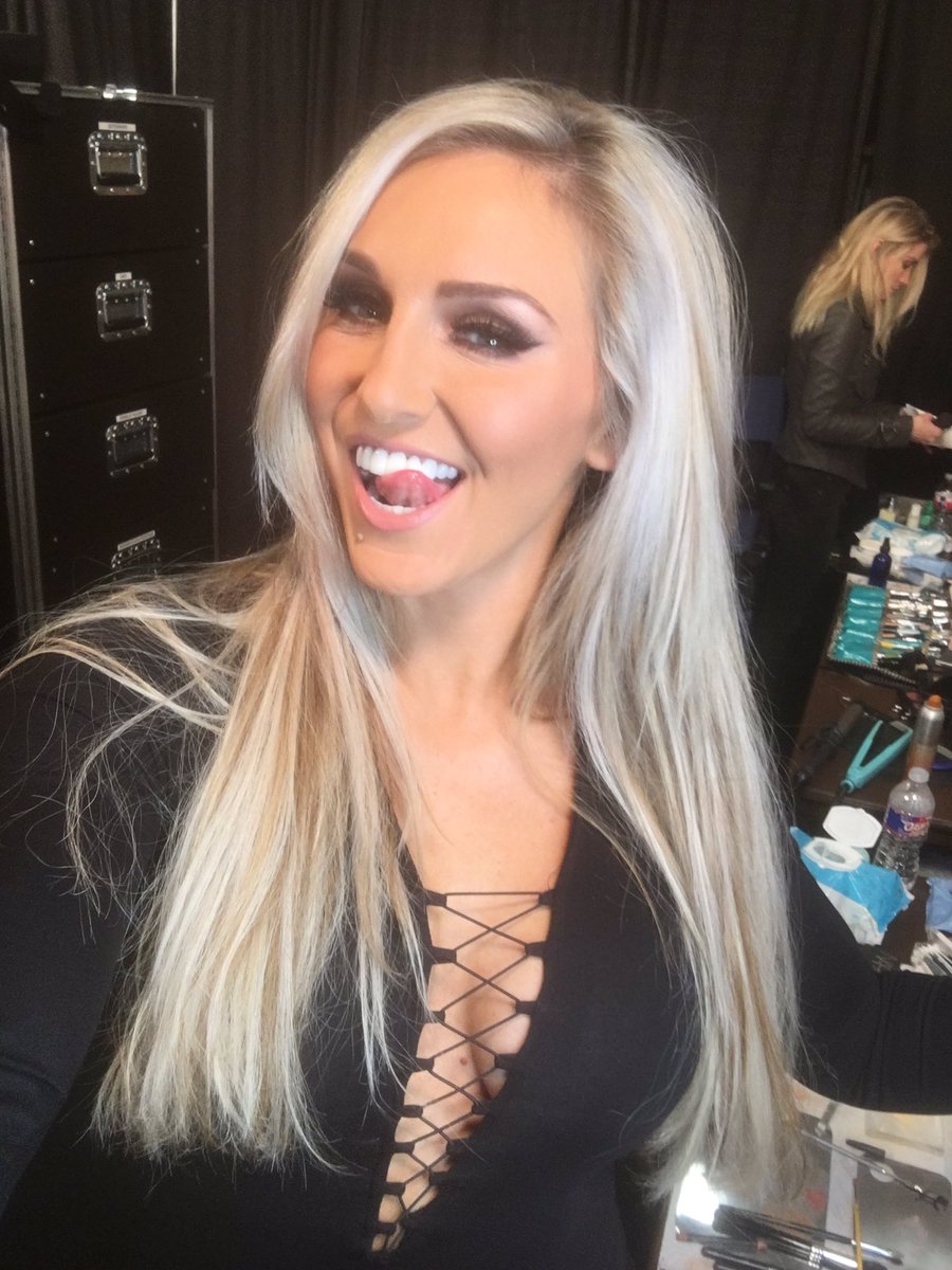 MsCharlotteWWE's tweet image. CHAMP at 💜. #Reclaim #RawAustin