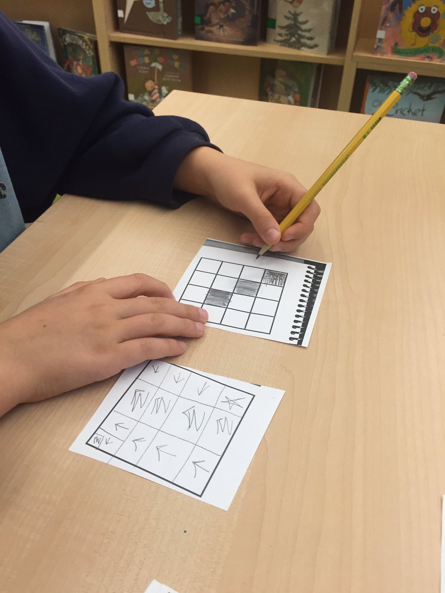 LauraRHartley's tweet photo. @mskuppers 4th graders creating &amp; reading "programs" to create grid paper designs. @codeorg #unpluggedprogramming #HourofCode #mnpslibhack https://t.co/q5yufndav0
