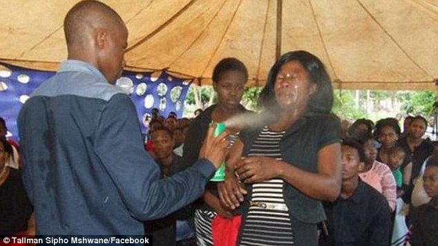 DailyMail's tweet photo. South African pastor claims he can cure cancer by spraying pesticide at people's faces https://t.co/FmZCeSrxiS https://t.co/NPrhwqre0W