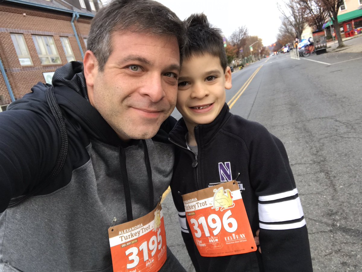 canelatwork's tweet photo. Sam showing some purple pride in his first 5-mile Turkey Trot! Join me with an NULC leadership gift on #GivingTuesday #CatsGiveBack https://t.co/nNUMjZWNeh