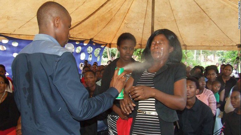 CNN's tweet photo. South African pastor sprays worshipers with Doom Super Multi Insect Killer 'to heal them' https://t.co/MZuxotvzyw https://t.co/qJsSc3arbM