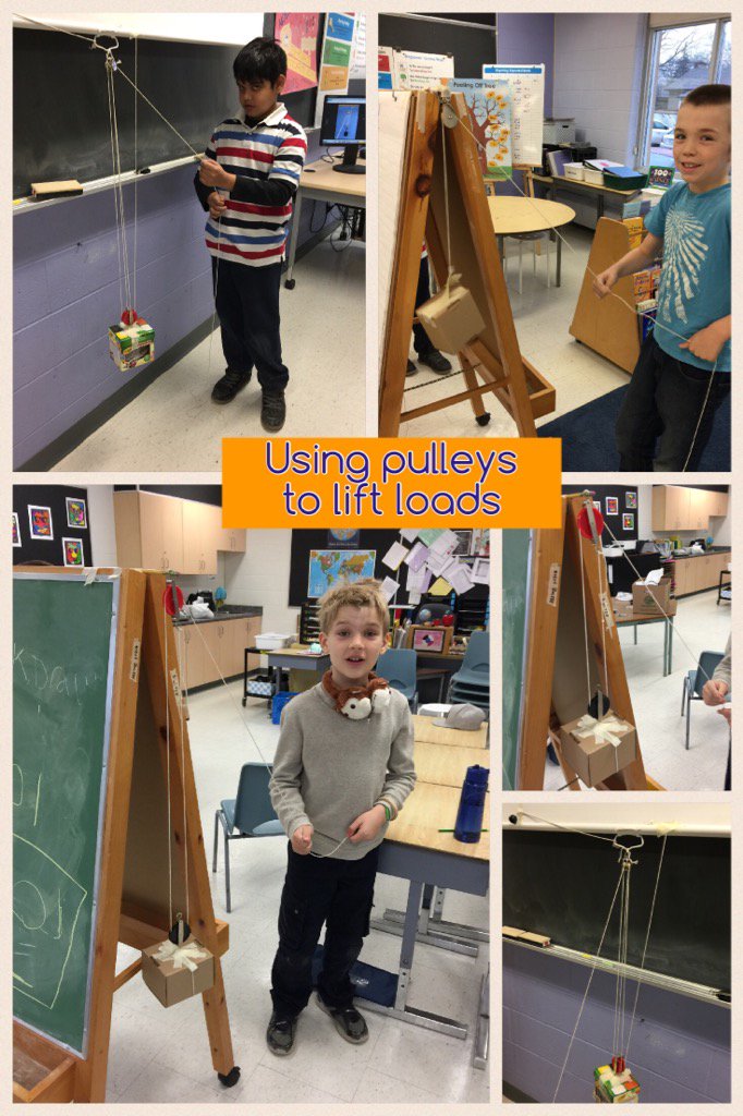 Grade 4s using pulleys to lift loads.