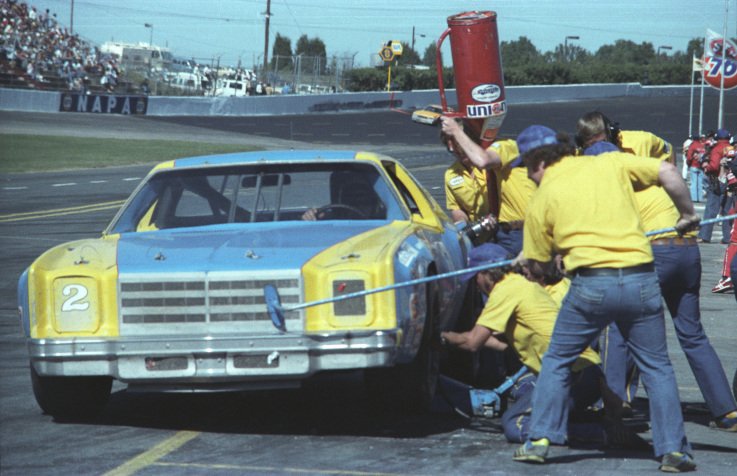 Basso488's tweet photo. Dale Earnhardt makes a pit stop during the 1979 NAPA National 500 @ Charlotte, Earnhardt finished 10th in the race. https://t.co/nlqJPn3Fc8
