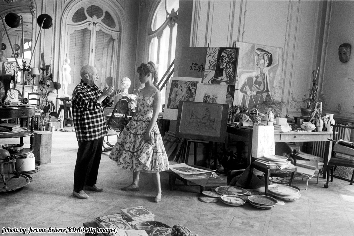 Pablo Picasso in his studio in Vallauris with actress Brigitte Bardot during the International Cannes Film Festival, 1956.