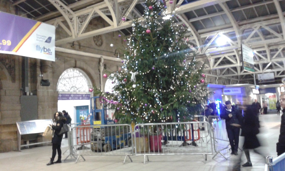 The Xmas tree goes up at Sheffield railway station
