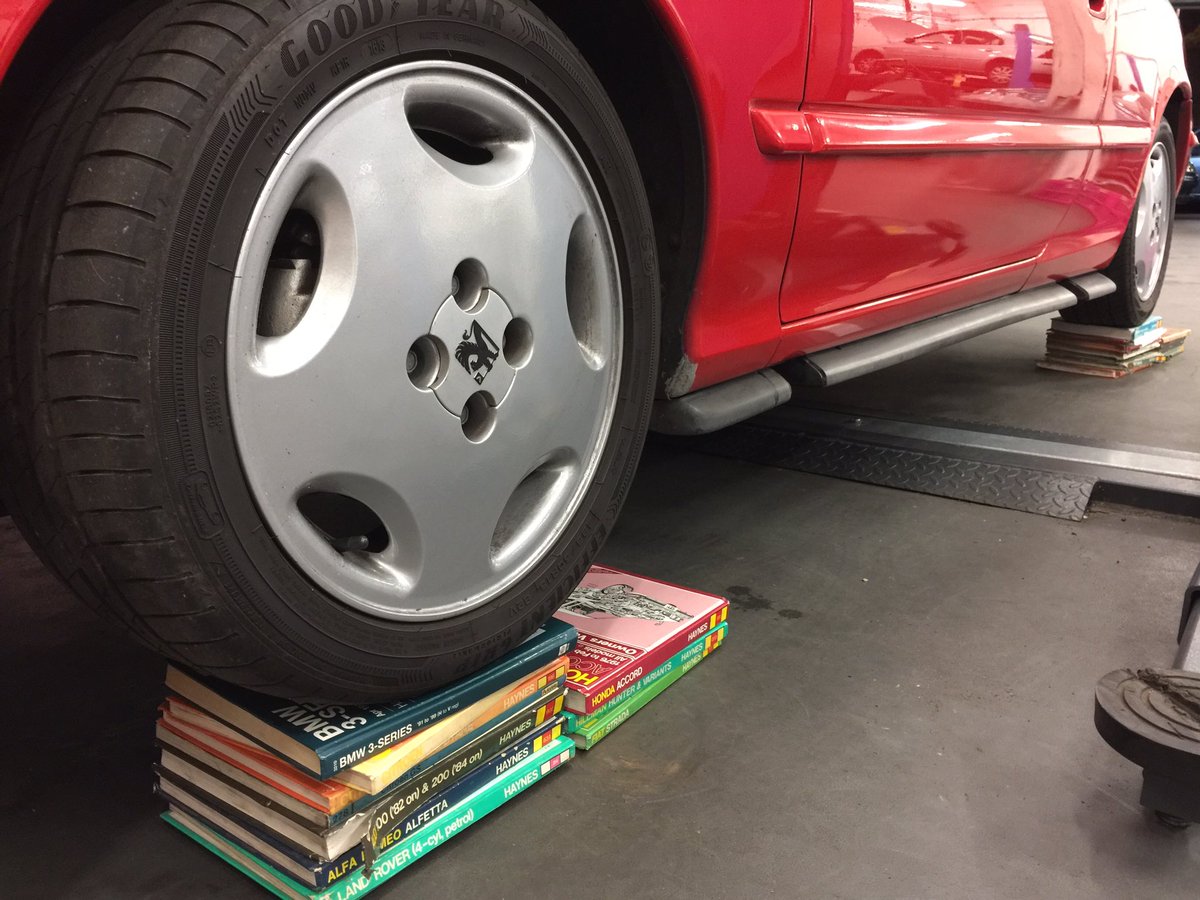 Our_Tim's tweet photo. I have found a new use for @HaynesManuals #LoweredCarProblems https://t.co/xsoDDv3yRp
