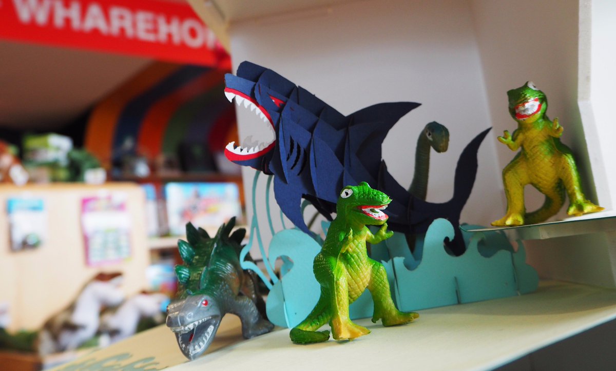 temanawanz's tweet photo. Menaced by a megalodon; even retail therapy is not without its perils. #Dinovember #Day25 #FlyPalmy @PNAirport https://t.co/aQXCOH2IrB