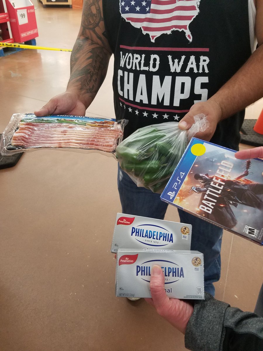 wendyluft's tweet image. Black Friday shopping and the couple in front of us waited half an hour to buy this... #footballfanprobs #hawkfan #priorities #Tailgating