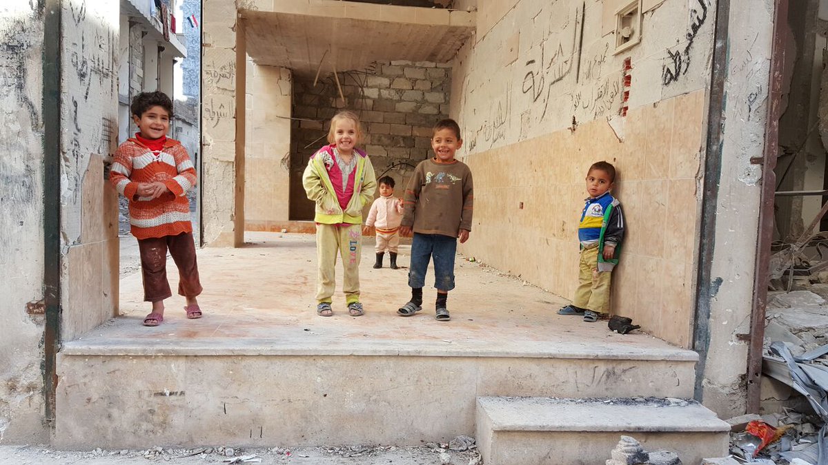 At 6 years old, Yousra is the same age as the conflict. But amidst #Aleppo's rubble, she and her friends still find a place to play.