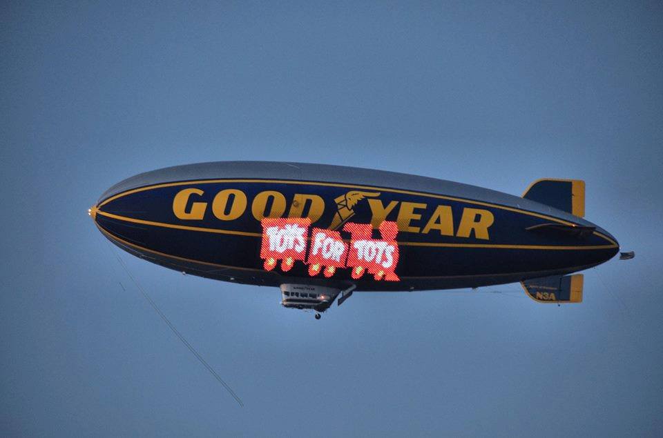 GoodyearBlimp's tweet photo. Heading out for #BlackFriday? Consider picking up a toy or two for our upcoming Toys for Tots drive. More details to come later! 🎁 https://t.co/BDdcsQMx24