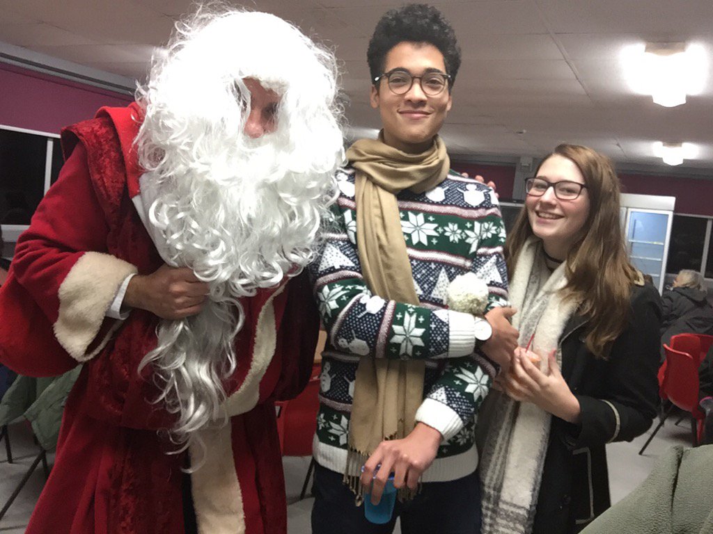 conyers_sl's tweet photo. Father Christmas thanking Francis and Rebecca for serenading shoppers as part of the Conyers School band. https://t.co/empv5MYEnh