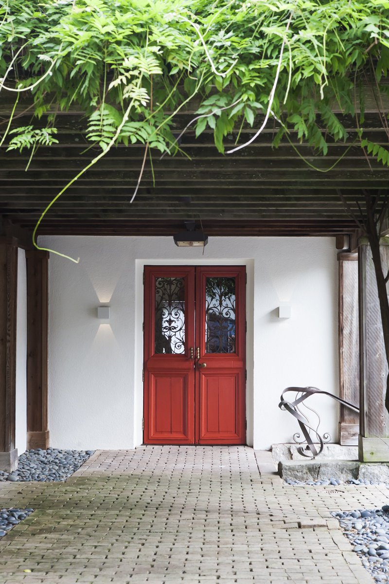 These red doors are always ready to welcome you with a great glass of wine to start your night. See you soon! (Pic: LuAnne DeMeo)