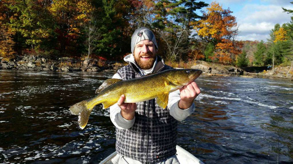 My pal josh with a beauty.... scale said 5pd11oz. Saw two more bigger than this gem!! #ilovefishing#walleye#fall