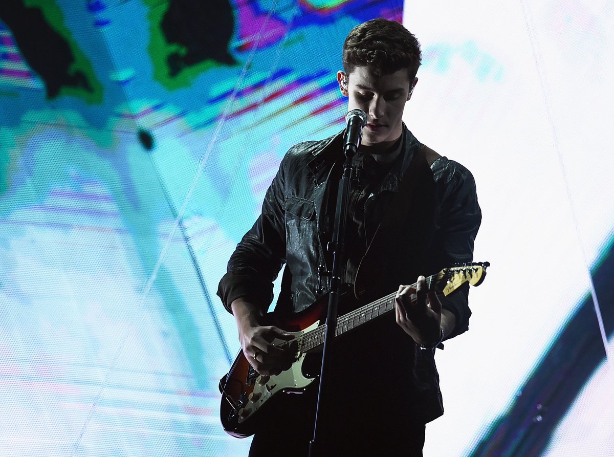 AMAs's tweet photo. He wasn't kidding when he said "I will gladly do it twice." Go watch @ShawnMendes' #AMAs encore performance on @XFINITY On Demand! https://t.co/jxt5EmKXge
