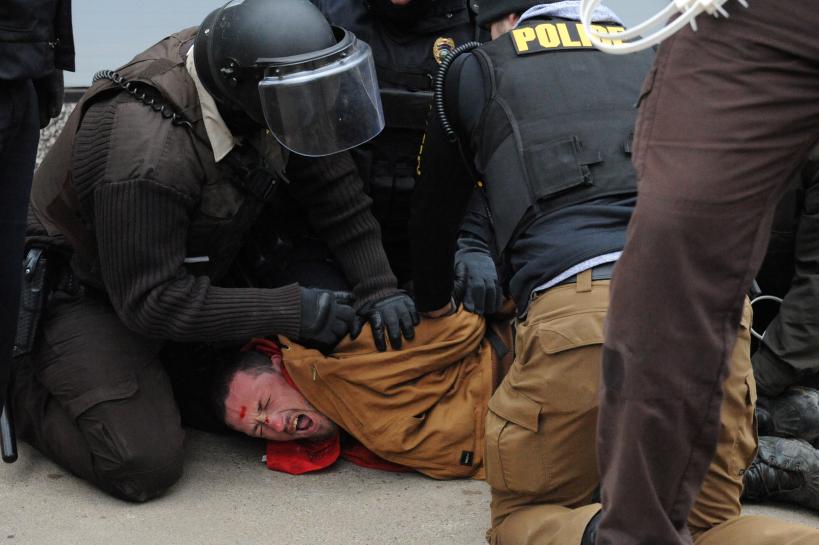 Reuters's tweet photo. Anti-pipeline protesters arrested at North Dakota shopping mall https://t.co/jz2qPwFv4a https://t.co/KFjtT2ePyV