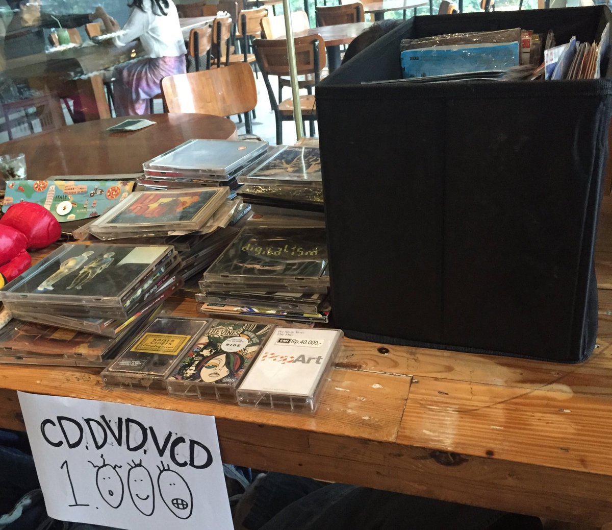 Dari CD original Kanye West dan Cozy Street Corner, sampai kaset The Vines, semuanya pukul rata @ Rp 1.000! Today only! #charitygaragesale