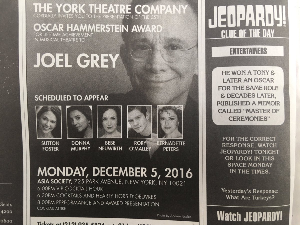 Hmm, that's s tough one. Okay, "Who is the guy smiling right next to your ironically placed clue?"