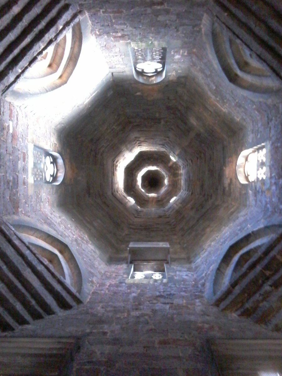 CurateDurrant's tweet image. Up the spire @StMikes_Exeter whilst the 'Unusually Good Book Fair' unfolds below. #PigeonFeathersEverywhere
#GloriousStoneSpace
#ExeterViews