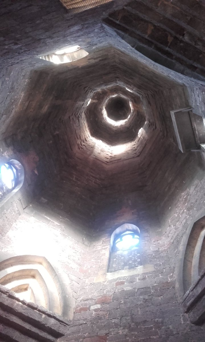 CurateDurrant's tweet image. Up the spire @StMikes_Exeter whilst the 'Unusually Good Book Fair' unfolds below. #PigeonFeathersEverywhere
#GloriousStoneSpace
#ExeterViews