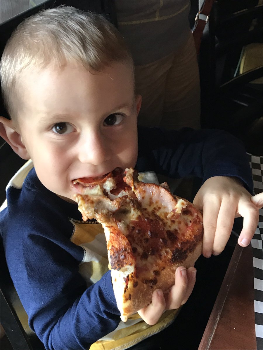 VisitTopeka's tweet image. Mason, age 4, is visiting Topeka and enjoying pizza from @AJsTopeka! He came all the way from Hawaii! #TopCity