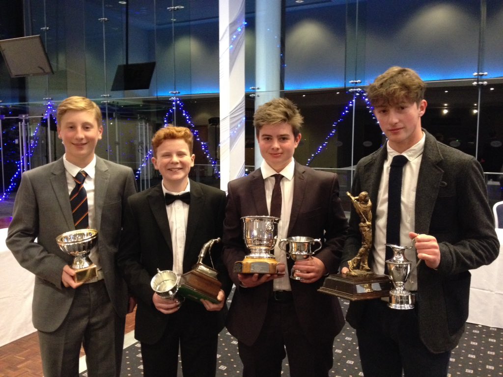George, Nick, Thomas and Ciaran collect YU team league, Seward, Hardman and Junior Champion Trophies