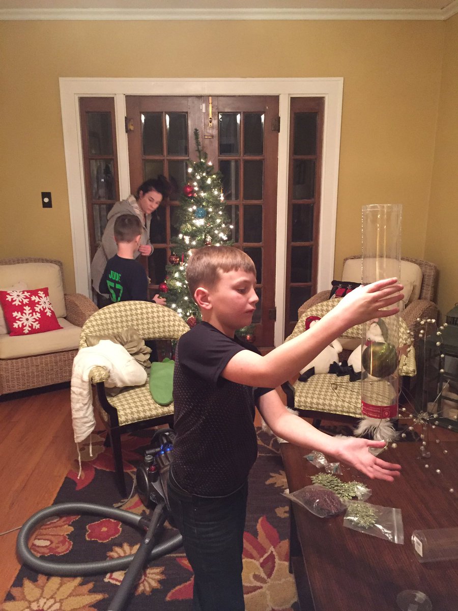 TrooperTodKHP's tweet image. A tree, 2 boys, + a strand of lights that won't work = #Christmas fun. 🎄 Now it's time for some marshmallows. No need to #BuckleUp 2nite! 😊